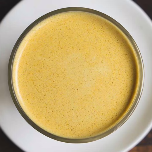 golden milk in a tea cup