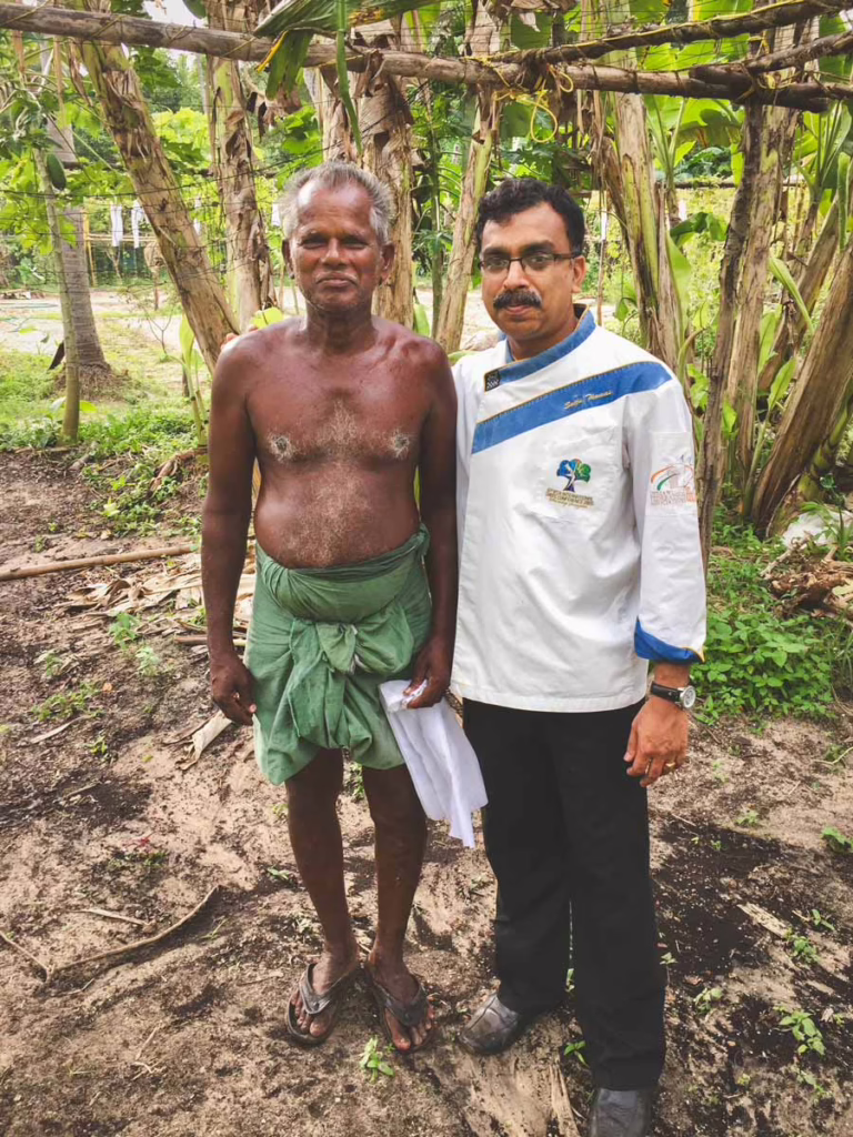 2 men standing in a garden